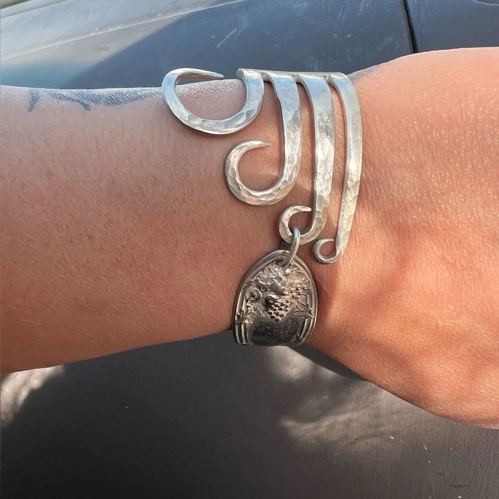 HANDMADE FORK BRACELET WITH STERLING CLOUSURE.
